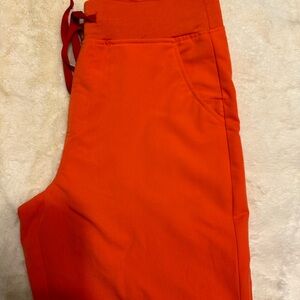 Bright Orange FIGS joggers. Never worn